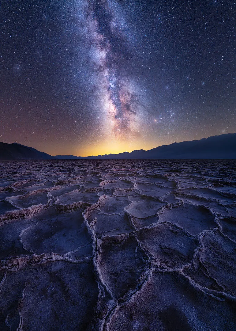 Badwater Milky Way © Abhijit Patil, Death Valley, California, USA, 2 September 2021. Runner up, Skycapes, APY 14. Equipment: iOptron SkyGuider Pro mount, Nikon Z6 II camera, 14 mm f/3.5 and f/11, ISO 100/1000, Sky: 300-second exposure Foreground: 5-second exposure.