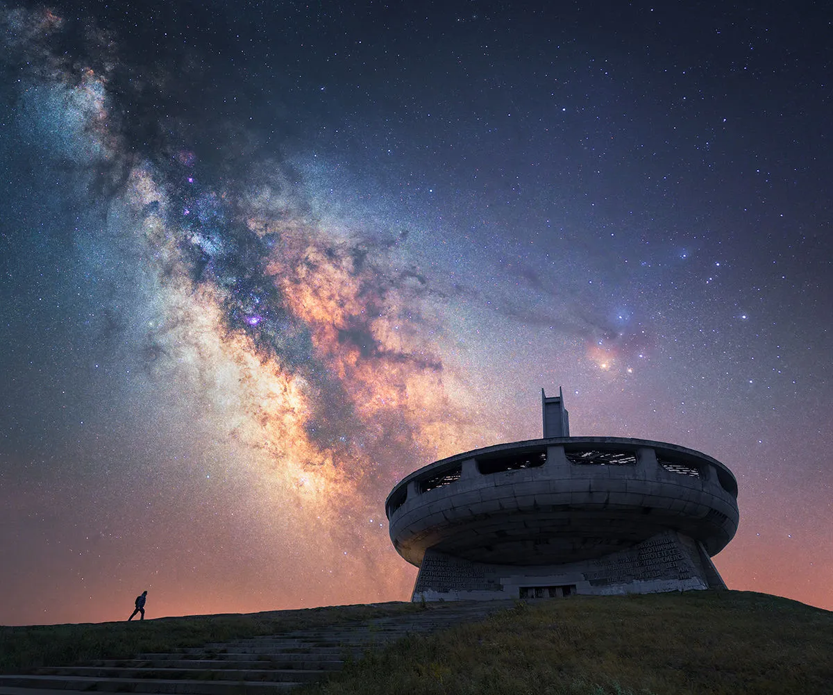 Back to the Spaceship © Mihail Minkov, Buzludzha, Balkan Mountains, Stara Zagora Province, Bulgaria, 12 August 2021. Runner up, People & Space, APY 14. Equipment: Sony A7 III camera, Foreground: 15 mm f/5.6, ISO 100, 3.2-second exposure, Sky: 28 mm f/3.5, ISO 800, 240-second exposure 