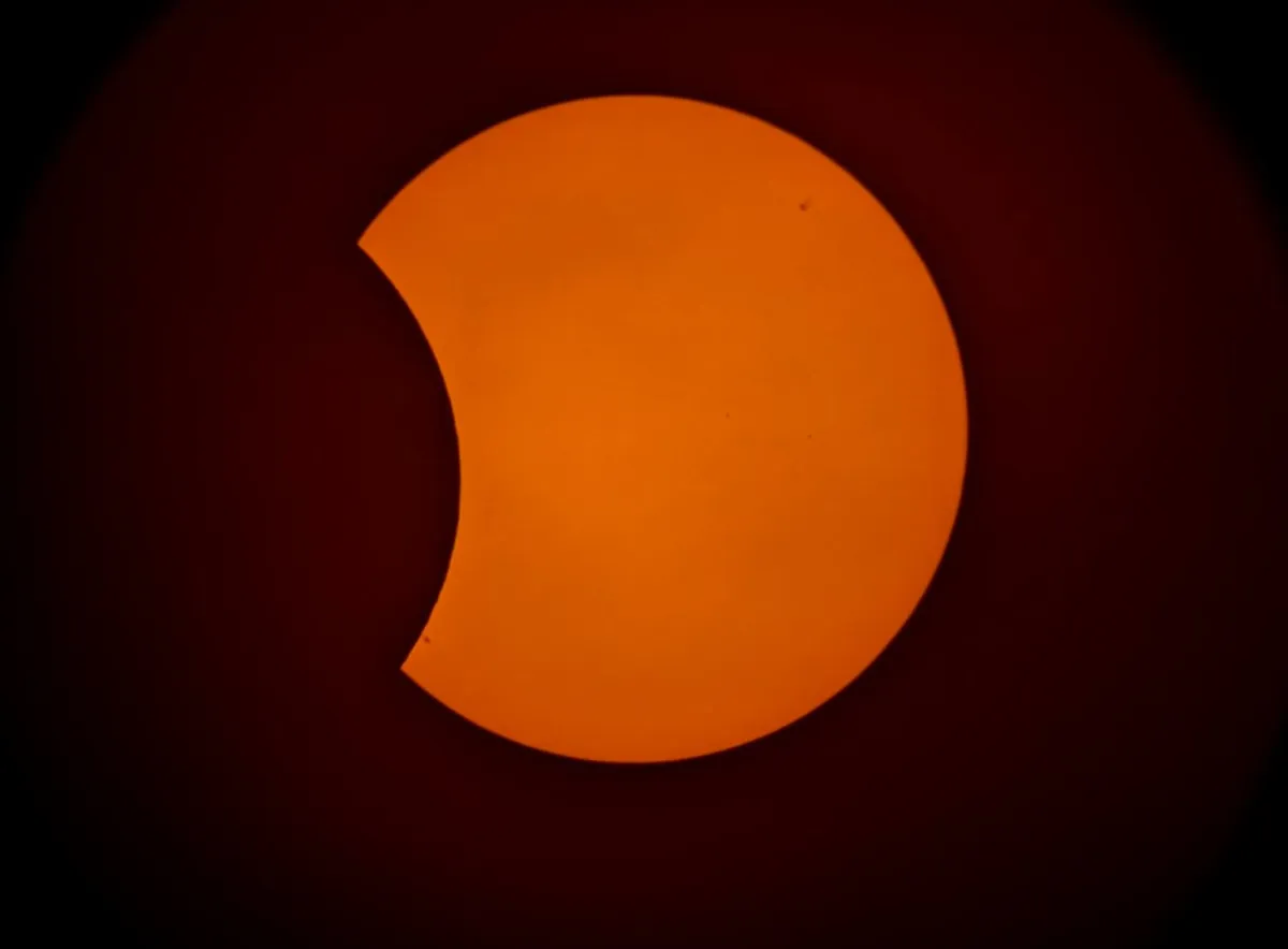 Partial Solar Eclipse, captured by Sonia Turkington, North Reddish, Stockport, UK, 25 October 2022, using a Sky-Watcher 10-inch Dobsonian a Google Pixel smartphone and Seymour 12” solar film.