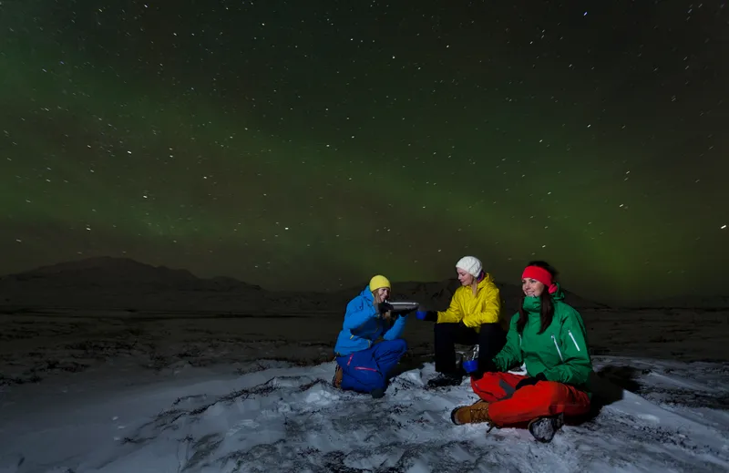 Stargazing with friends is a great winter and Christmas activity. Credit: Elli Thor Magnusson / Getty Images
