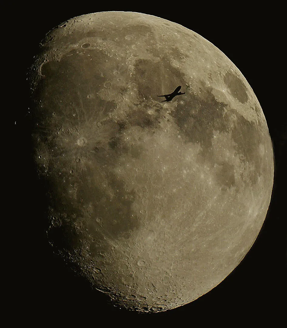 The Moon, with a Boeing 737, John Tipping, Northwich, Cheshire, 11 June 2022 Equipment: Canon 700D DSLR camera, Sky-Watcher SkyMax 180 Pro Maksutov-Cassegrain reflector, iOptron iEQ45 Pro mount