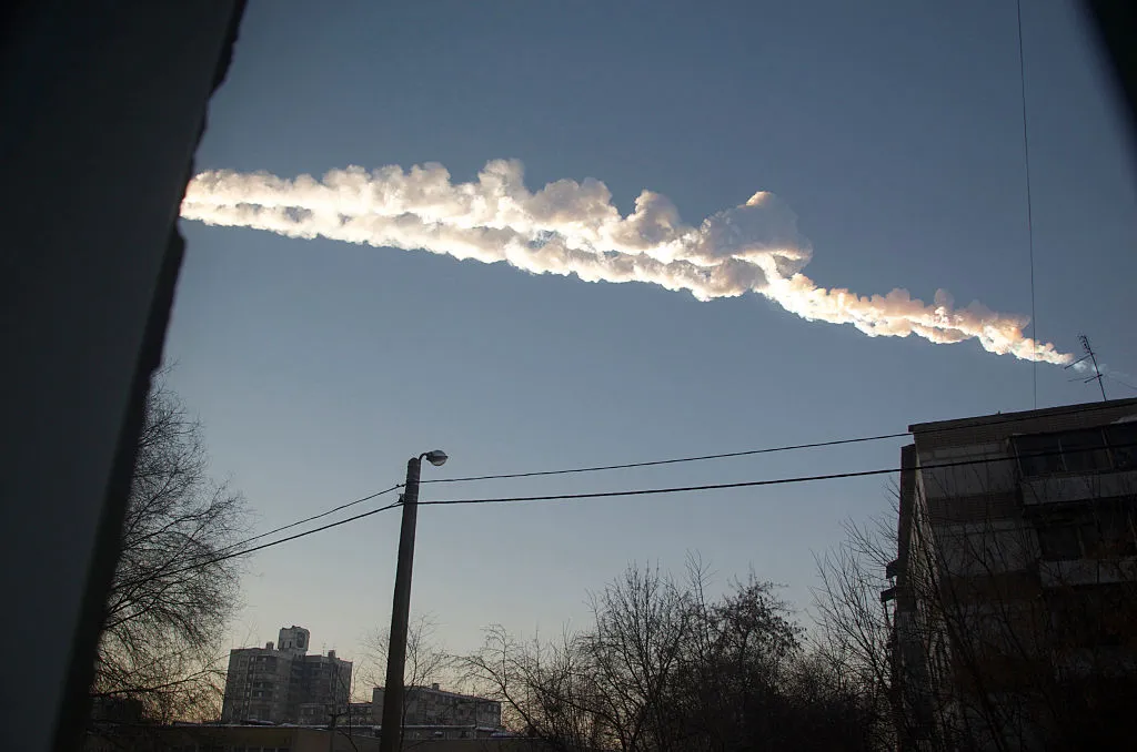 The trail of the Chelyabinsk meteor across the sky. Photo by Elizaveta Becker/ullstein bild via Getty Images