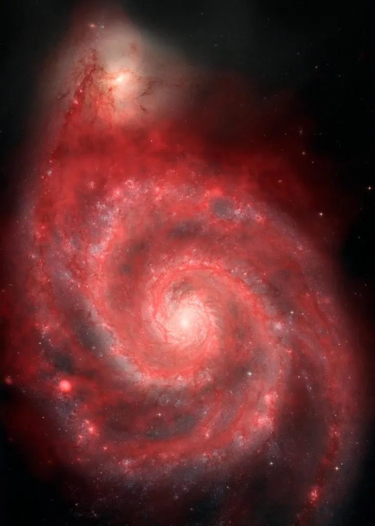 A view of the Whirlpool Galaxy in optical light (white) and radio waves (red). Credit: NRAO/AUI/NSF; HST composite by B. Saxton