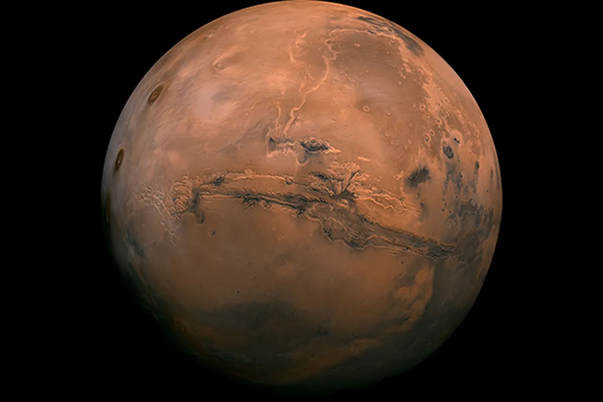 Why is Mars known as the Red Planet?