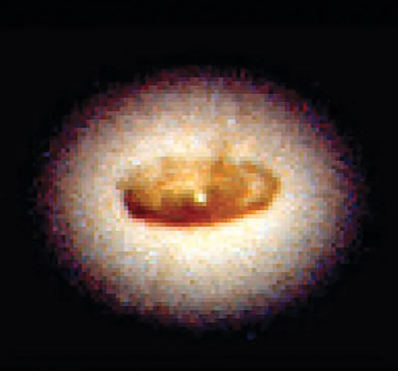 4 December 2005 This doughnut shape is an 800 lightyear-wide disc of dust fuelling a black hole at the centre of galaxy NGC 4261. The doughnut is calculated to be 1.2 billion times the mass of the Sun while the black hole’s gravity is capable of pulling in enough surrounding material to make 100,000 stars like our Sun.