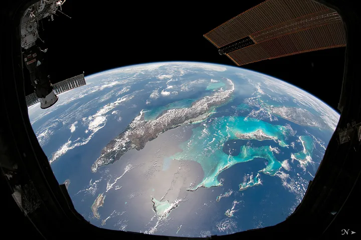 An astronaut’s view of the Caribbean from space. The land mass in the centre is Cuba; on the far right is Florida. In between is the Bahamas. Credit: NASA