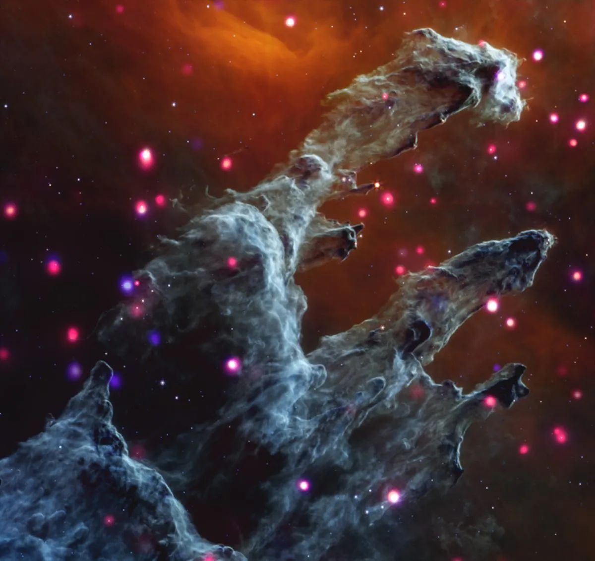 M16, the Eagle Nebula, as seen by the Chandra X-ray Observatory and the James Webb Space Telescope. Credit: Credit: X-ray: Chandra: NASA/CXC/SAO, XMM: ESA/XMM-Newton; IR: JWST: NASA/ESA/CSA/STScI, Spitzer: NASA/JPL-Caltech; Optical: Hubble: NASA/ESA/STScI, ESO. Image Processing: L. Frattare, J. Major, and K. Arcand.