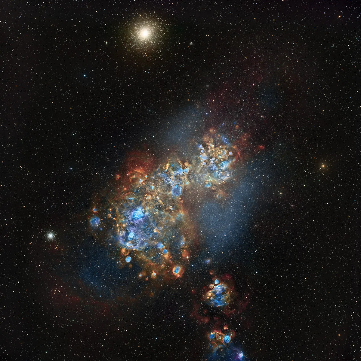 Nebulae of the Small Magellanic Cloud, by Jonathan Lodge, Heaven's Mirror Observatory, Yass Valley, New South Wales, Australia. Category: Galaxies Equipment: Takahashi FSQ-106ED telescope (with 0.73 x focal reducer), Astrodon SHOLRGB 2GEN filter, Paramount MX  mount, FLI ProLine 16803 camera, 382 mm f/3.6, 29 hours total integration