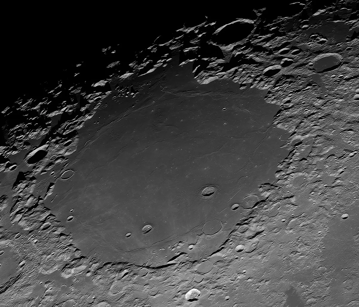 Mare Crisium: From Light to Dark, by Andrea Vanoni, Porto Mantovano, Mantua, Lombardy, Italy. Category: Our Moon Equipment: Newton Ares 405mm F4.5 telescope, Baader R-filter, Sky-Watcher EQ8 mount, ZWO ASI178MM camera, 6000 mm f/20, 1/400 exposure