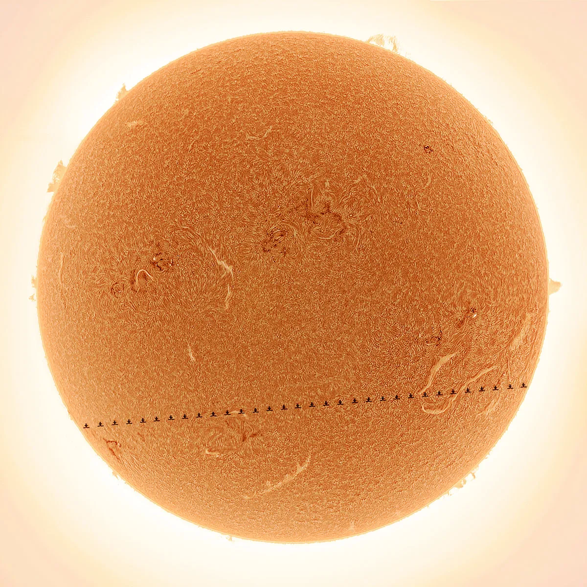 China Space Station Transits Active Sun, by Letian Wang, Beijing, China. Category: People & Space Equipment: Lunt 152T telescope, Rainbow RST-135 mount, TeleVue 2X Barlow lens, ZWO ASI432MM camera, 900 mm f/6, 0.8-millisecond and 1.3-millisecond exposures