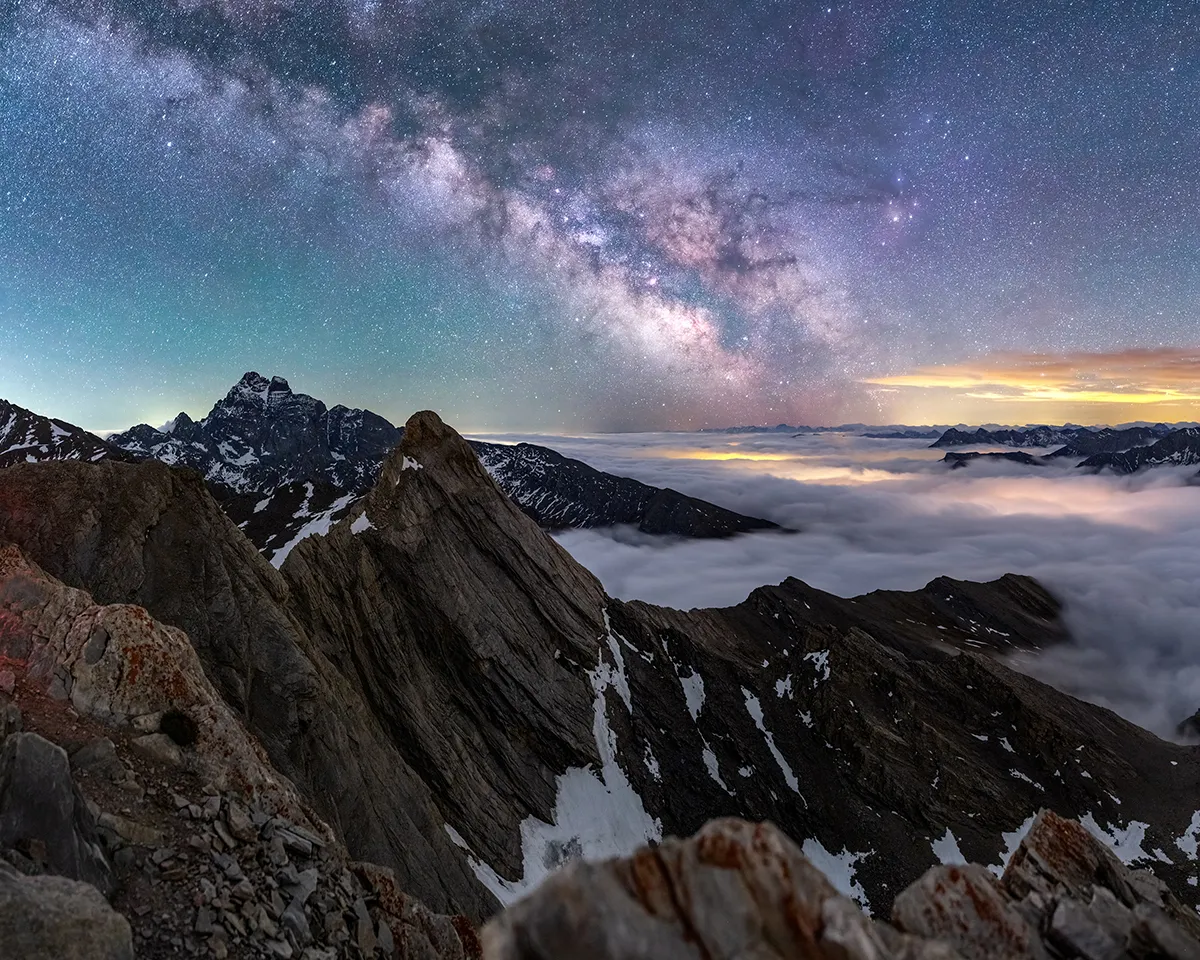 On Top of the Dream, by Jeff Graphy, Pain de Sucre, Queyras, France Category: Skyscapes Equipment: Canon EOS 6D camera, 35 mm f/2.8, ISO 6400; Sky: 8-second exposure; Foreground: 20-second exposure