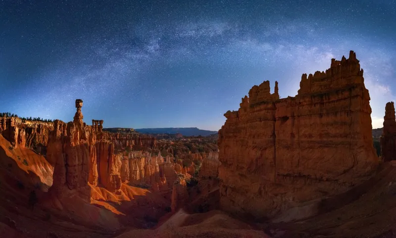 The Milky Way over Thor hammer in Bryce Canyon National Park, Utah. Credit: TONNAJA / Getty