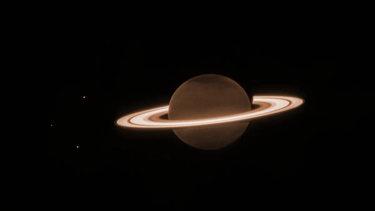 An image of Saturn and some of its moons, captured by the James Webb Space Telescope’s NIRCam instrument on 25 June 2023. Credit: NASA, ESA, CSA, STScI, M. Tiscareno (SETI Institute), M. Hedman (University of Idaho), M. El Moutamid (Cornell University), M. Showalter (SETI Institute), L. Fletcher (University of Leicester), H. Hammel (AURA); image processing by J. DePasquale (STScI).