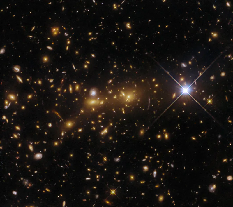 Galaxy clusters eMACS J1353.7 4329 Hubble Space Telescope, 10 July 2023 Credit: ESA/Hubble & NASA, H. Ebeling