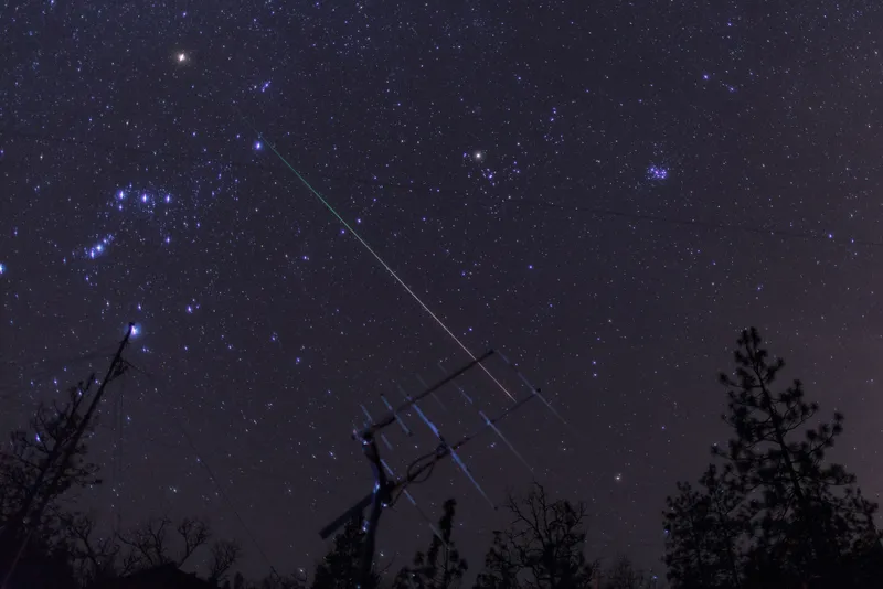 Geminid meteor over ham radio satellite antenna. Credit: David Hoffmann Photography / Getty Images