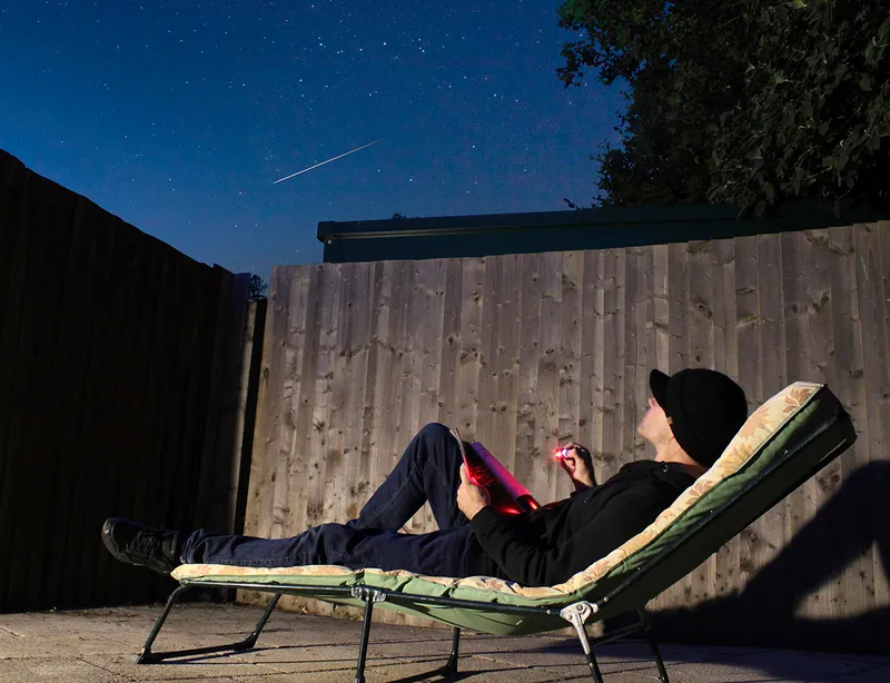 A sun lounger and a red light torch are a meteor observer's best friends.