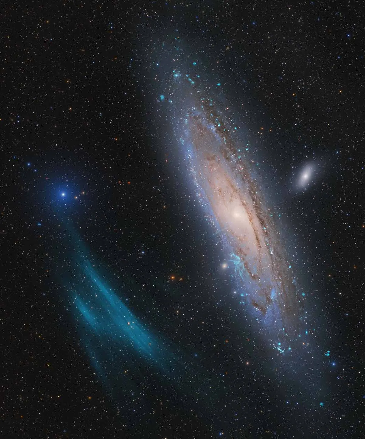 Andromeda, Unexpected © Marcel Drechsler, Xavier Strottner, Yann Sainty, Location: Near Nancy, France. Winner, Galaxies category and overall winner. Equipment: Takahashi FSQ-106EDX4 telescope, Sky-Watcher EQ6 Pro mount, ZWO ASI2600MM Pro camera, 382 mm f/3.6, multiple exposures between 1 and 600 seconds, 111 hours total exposure