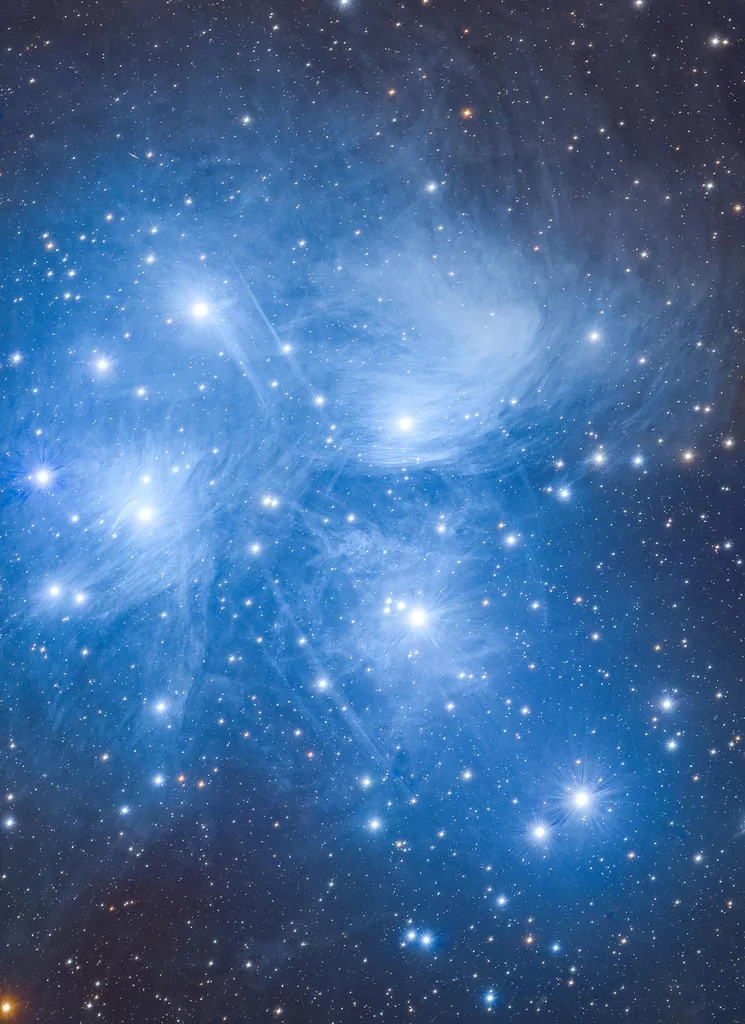 Blue Spirit Drifting in the Clouds © Haocheng Li and Runwei Xu. Location: Shangri-la City, Yunnan, China. Runner-up, Young Astronomy Photographer of the Year. Taken with a Sky Rover 102APO telescope, Optolong LRGB filter, NEQ6 mount, ZWO ASI294MM camera, 714 mm f/7, ISO 100, multiple 300-second exposures, 9 hours total exposure