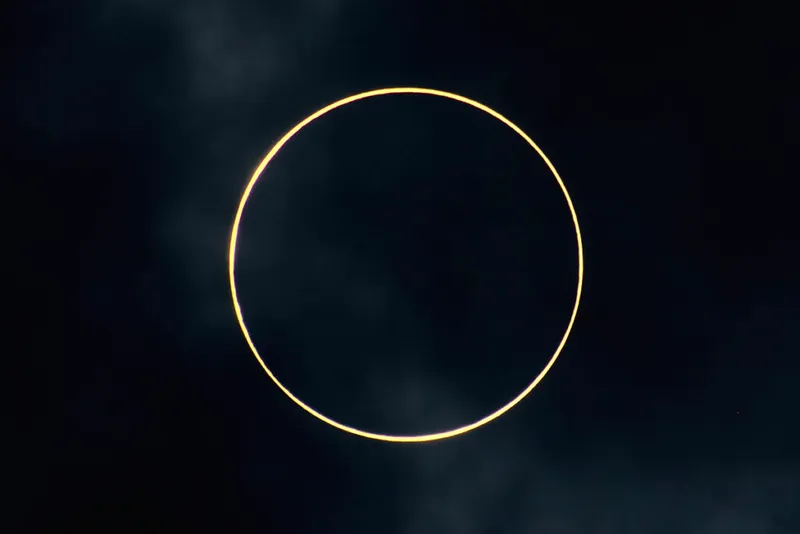 If the Moon is marginally closer to the Sun, an annular eclipse occurs. Credit: Jingying Zhao / Getty Images