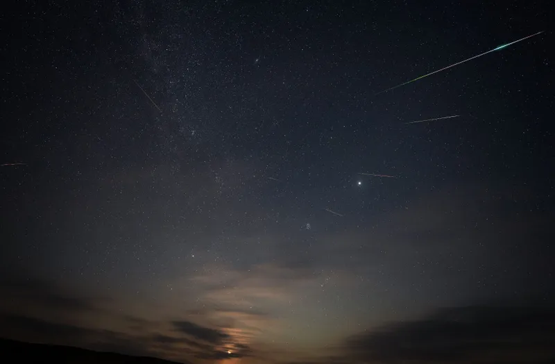 Waning crescent and the Perseids Ahmed Waddah, Al Fayoum Desert, Egypt, 11 August 2023 Equipment: Nikon Z6 II mirrorless camera, Nikkor Z 14-24mm f/2.8 S lens, iOptron SkyGuider Pro mount