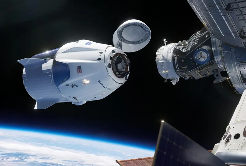 Crew Dragon approaches the Harmony space port on the ISS.