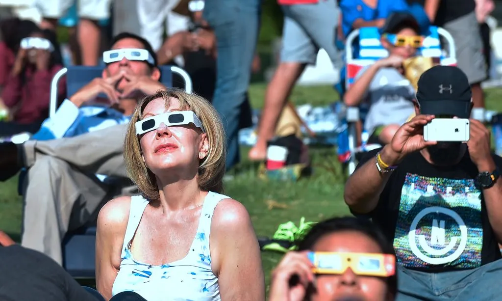 Not going to be able to watch the April 8 eclipse in person? Watch it online instead! Credit: FREDERIC J. BROWN/AFP via Getty Images)