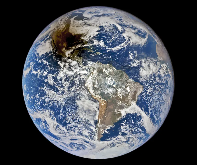 What a solar eclipse looks like from space. The Moon's shadow cast on Earth during the October 14 2023 annular solar eclipse, captured by NASA's DSCVR (Deep Space Climate Observatory). Credit: courtesy of the DSCOVR EPIC team