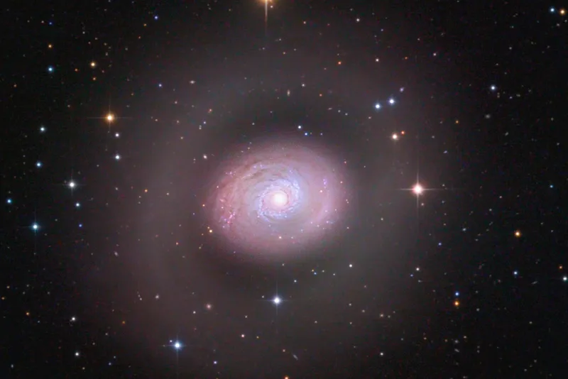 The galaxy with no stars and all dark matter named Cloud-9 could be a satellite of spiral galaxy M94. Credit: Michael Deger/ccdguide.com
