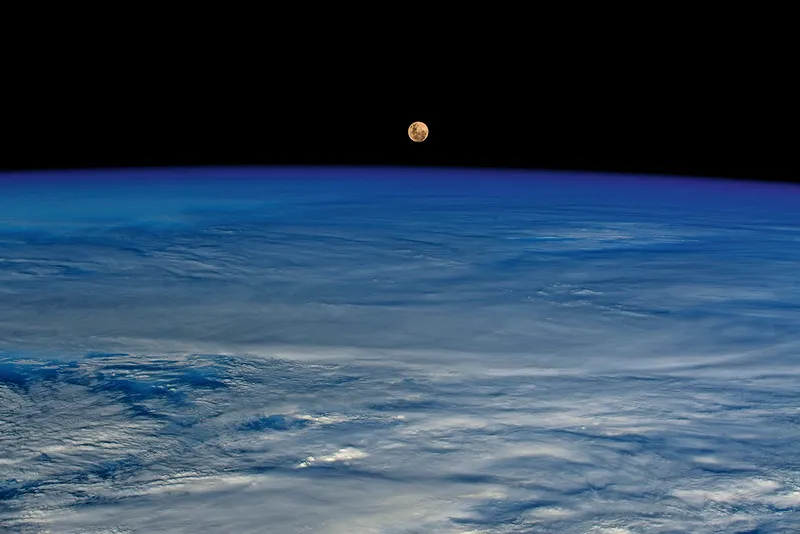 What the Moon looks like from space. The Moon over Earth, as seen from space, captured by ESA astronaut Thomas Pesquet, featured in his book The Earth in Our Hands. Credit: Firefly Books
