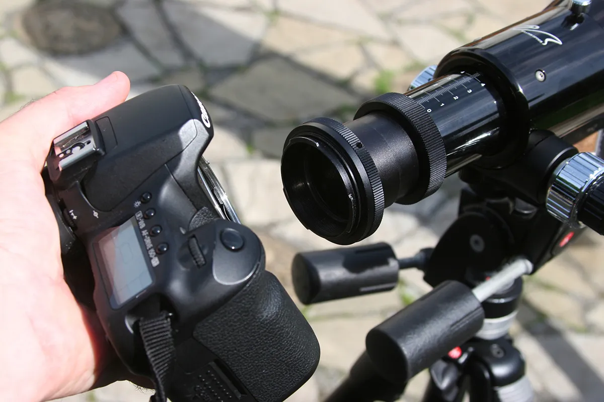 Use a T-ring and nosepiece to attach your DSLR to your telescope in place of the lens. Credit: Charlotte Daniels