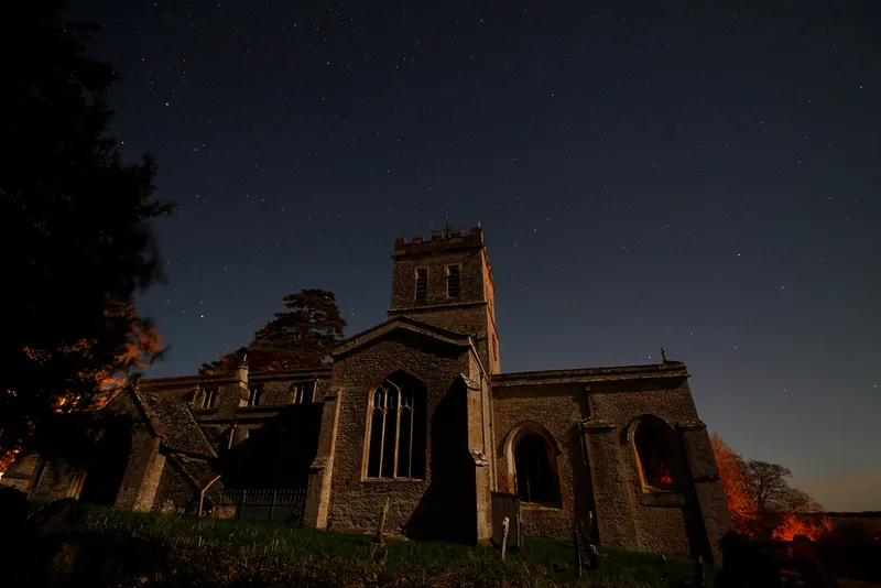 One of Mary’s original frames, showing a church prominent in the foreground and a clear night sky behind. Credit: Mary McIntyre