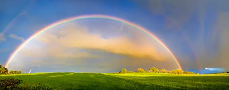Rainbows don't really touch the ground. It's all an illusion! Credit: mikroman6 / Getty Images