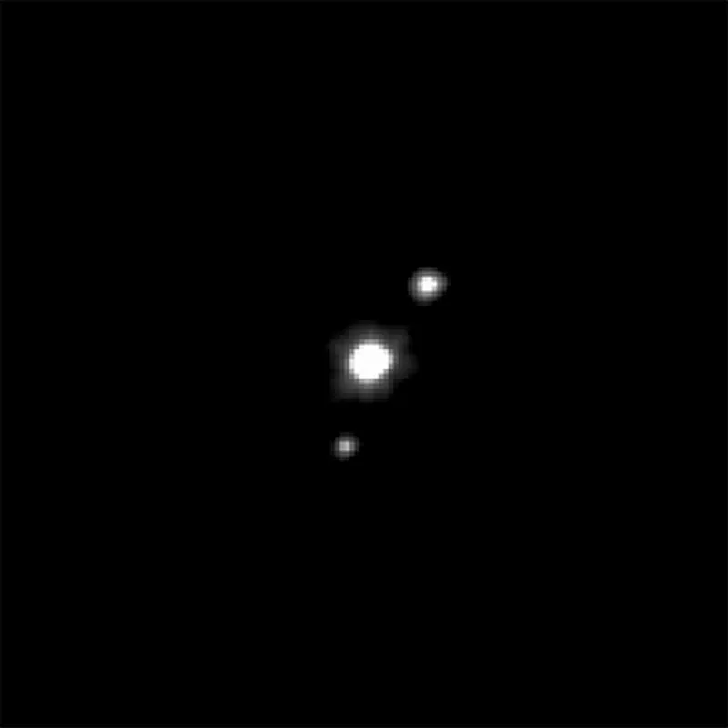 Hubble Space Telescope image of dwarf planet Haumea and its two moons. Credit: ESA/NASA