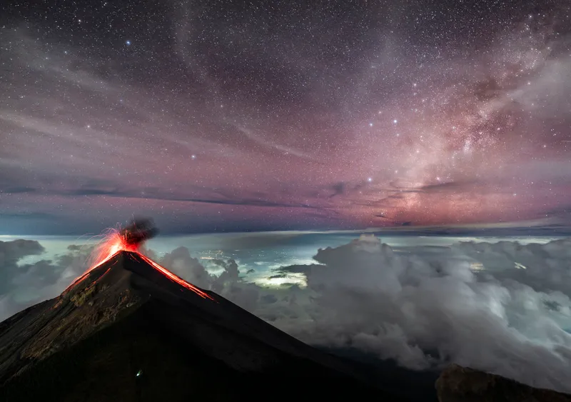 Milky Way over Volcan de Fuego Chirag Upreti, Acatenango Summit, Guatemala., 9 November 2023 Equipment: Astromodified Sony a7 III mirrorless camera, Sigma 14-24mm f/2.8 lens, Leofoto LS-255CEX Ranger tripod