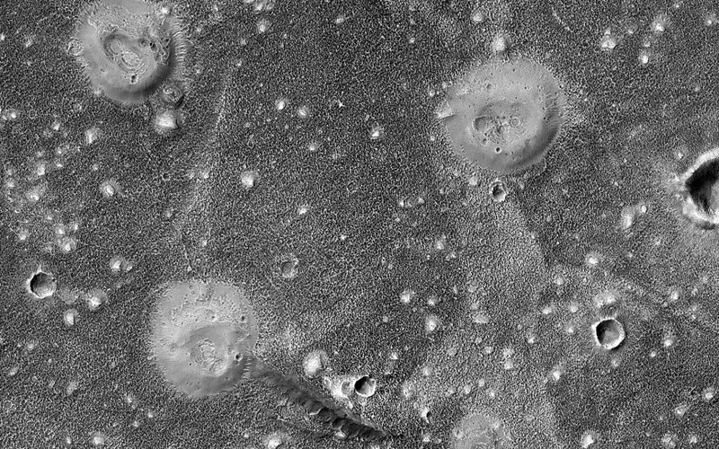 Mud volcanoes on Mars Mars Reconnaissance Orbiter, 19 December 2023 Credit: NASA/JPL-Caltech/University of Arizona