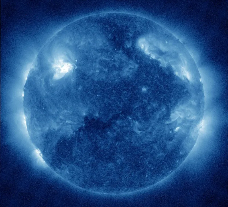 The Sun, but blue! This view of the Sun was captured by NASA's Solar Dynamics Observatory in the 335 angstrom wavelength, which is suitable for observing hotter magnetically active regions in the Sun's corona. Credit: NASA/SDO