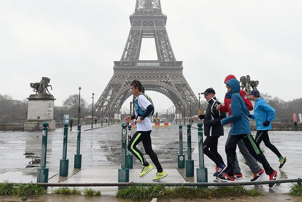French ultra long-distance runner Serge Girard begins his tour around the world in Paris, 31 january 2016. Credit: ALAIN JOCARD/AFP via Getty Images)