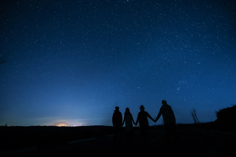 If a group of people all see the same unknown object in the night sky, chances are they will influence each other's testimony. Credit: AerialPerspective Images/Getty Images