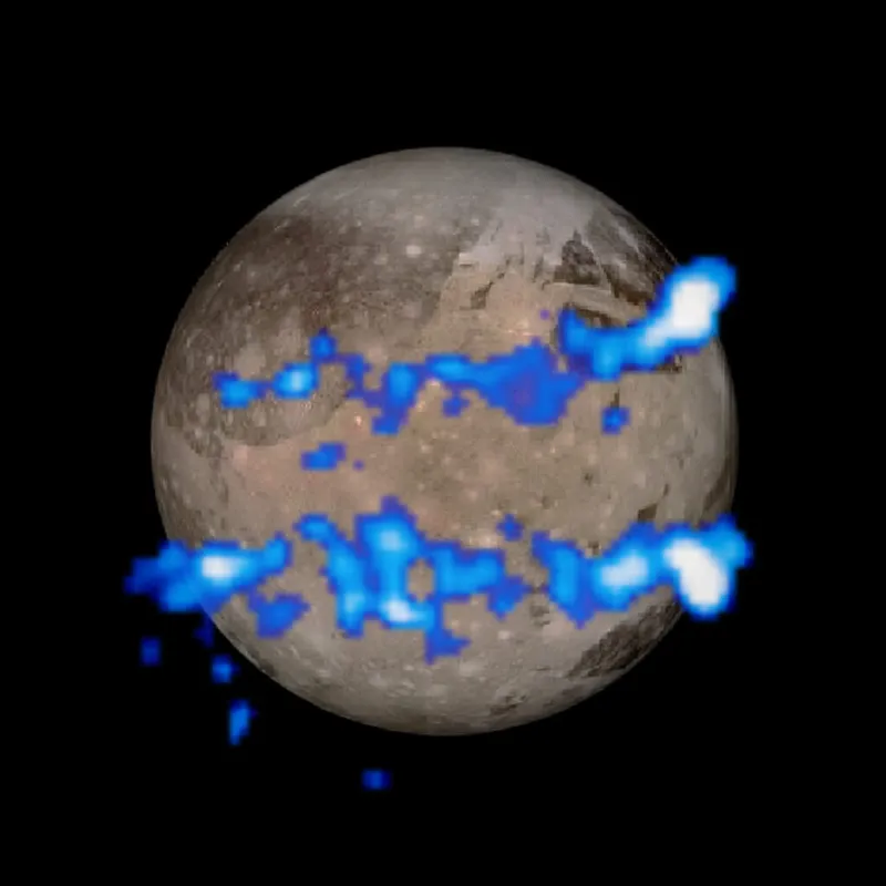 Image showing aurora belts on Jupiter's moon Ganymede, coloured blue. Belts were observed by the Hubble Space Telescope.
Aurora credit: NASA, ESA, and J. Saur (University of Cologne, Germany)
Ganymede globe credit: NASA, JPL, and the Galileo Project