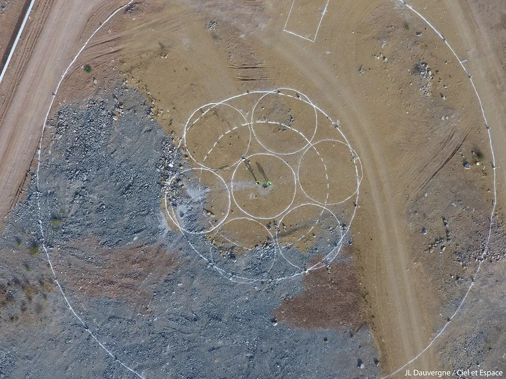 Overhead view of the chalking of the Giant Magellan Telescope mirrors on the ground, representing the shadow of the telescope mirror array. Credit: JL Dauvergne /Ciel et Espace