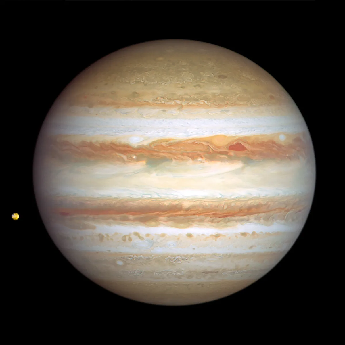 This image of Jupiter and its moon Io was captured by the Hubble Space Telescope on January 6, 2024.  Credit: NASA, ESA, STScI, Amy Simon (NASA-GSFC)