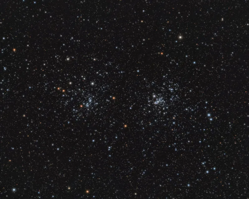 Perseus Double Cluster Mark Germani, Vancouver, British Columbia, Canada, 22-23 December 2023 Equipment: ZWO ASI533MC Pro camera, William Optics Zenithstar 61 apo refractor, iOptron CEM26 mount