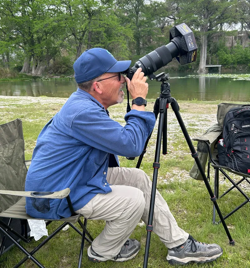 An eclipse photographer sets up beside the river to get a 'holy grail' image of the Sun's corona during the April 8 eclipse, Kerrville, Texas. Credit: Yvette Cook