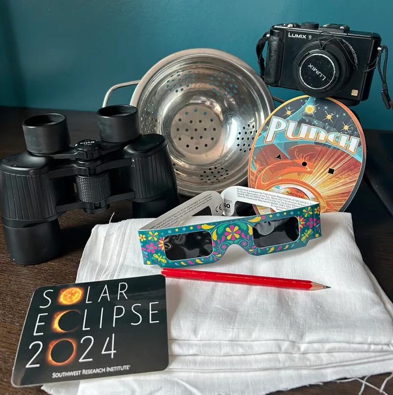 Everything an eclipse chaser needs. The contents of my backpack tomorrow. Note the colander for solar projection! Credit: Yvette Cook