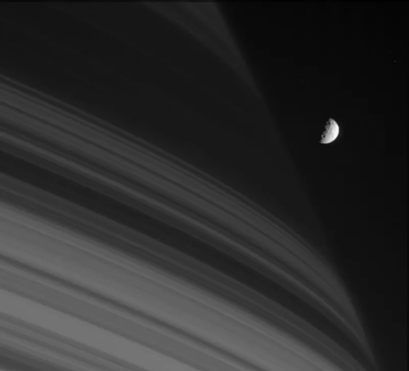 Saturn's moon Mimas is dwarfed by Saturn's rings in this image captured by the Cassini spacecraft on 18 July 2005. Credit: NASA/JPL/Space Science Institute