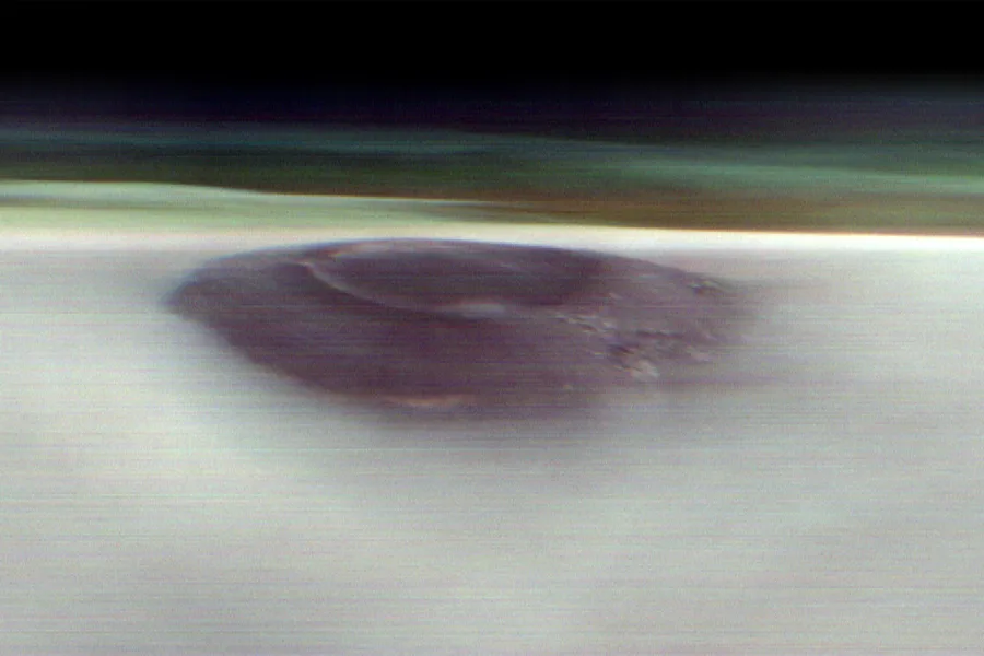 Giant Martian volcano breaks through clouds in dramatic new image | BBC ...