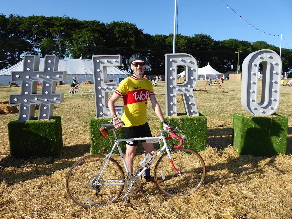 Cyclist at Eroica Brittania 2017 with vintage bicycle and wearing wool cycling clothing