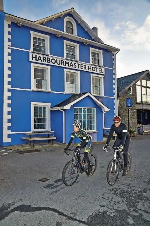 Cyclists outside the Harbourmaster Hotel in Aberaeron