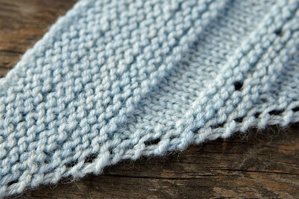 Shawl design yarn over edge