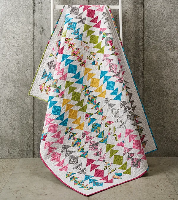 Quilt with triangle ladder pattern